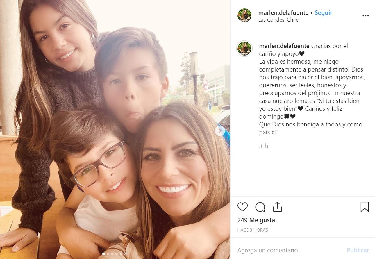 Marlene junto a sus hijos